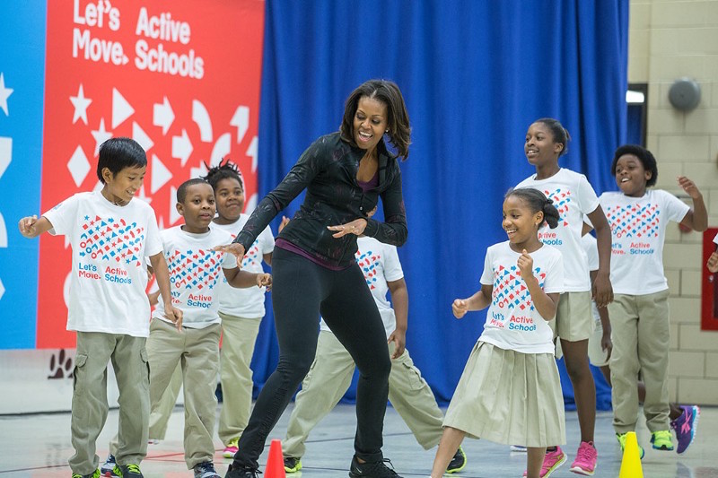 Michelle Obama dancing with children