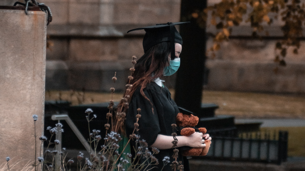 Graduate walking during pandemic