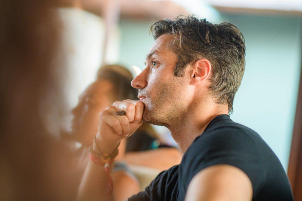 Man listening to a workshop